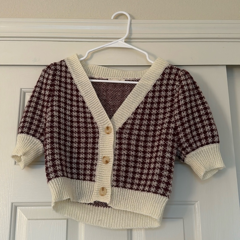 Red and white sweater vest